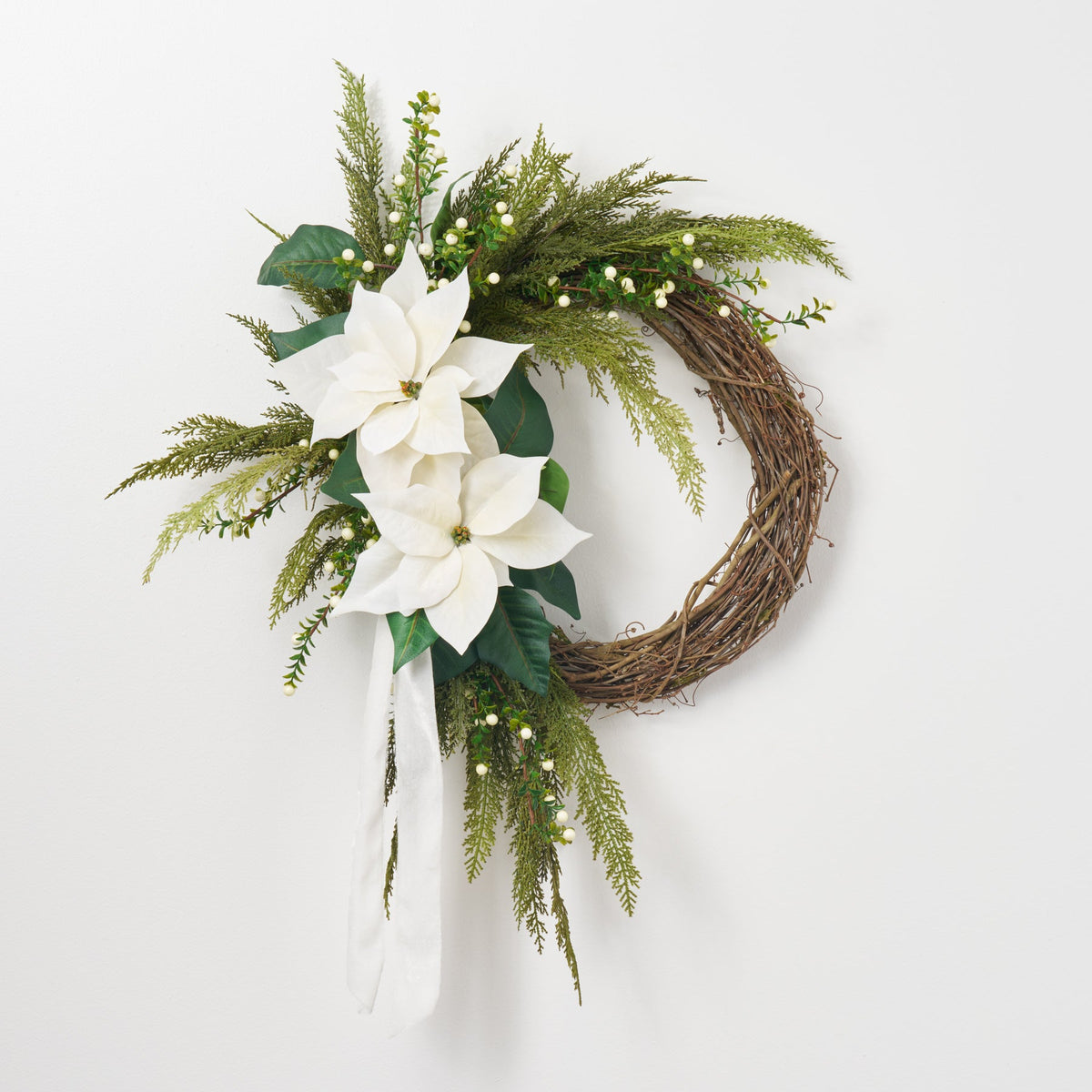 Lifelike White Poinsettia, Real Touch Cedar, Boxwood & Cream Snowberry with White Velvet Ribbon Christmas Holiday Asymmetrical Wreath