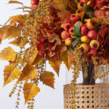 Golden Hour Fall Hydrangea, Birch Leaf, Orange Crater Berry & Yellow Astilbe Water Illusion Arrangement in Rattan Vase